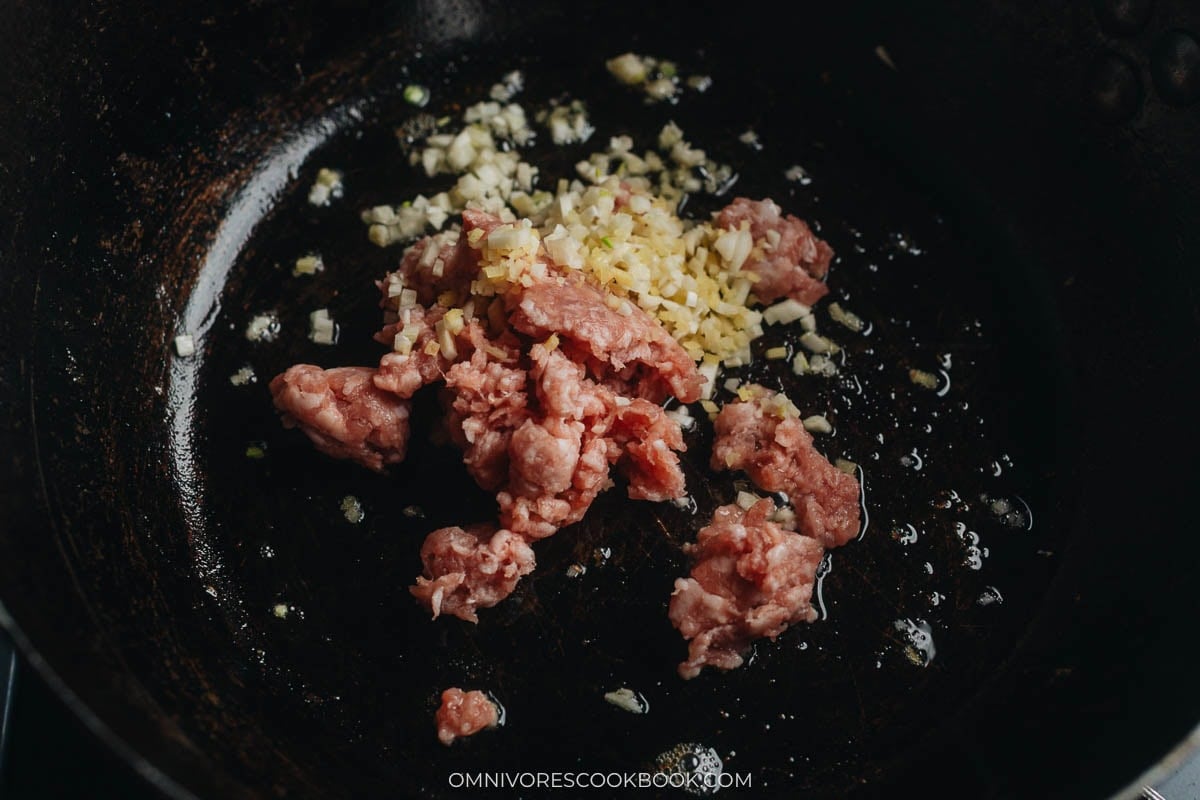 Stir-fry the pork and aromatics