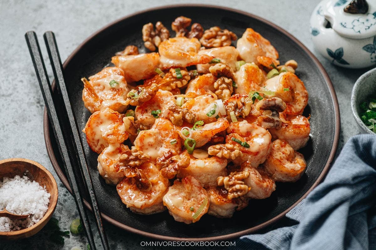 walnut shrimp plated with chopsticks and salt