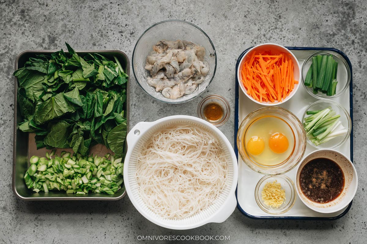 Ingredients for shrimp mei fun prepared and organized before cooking.