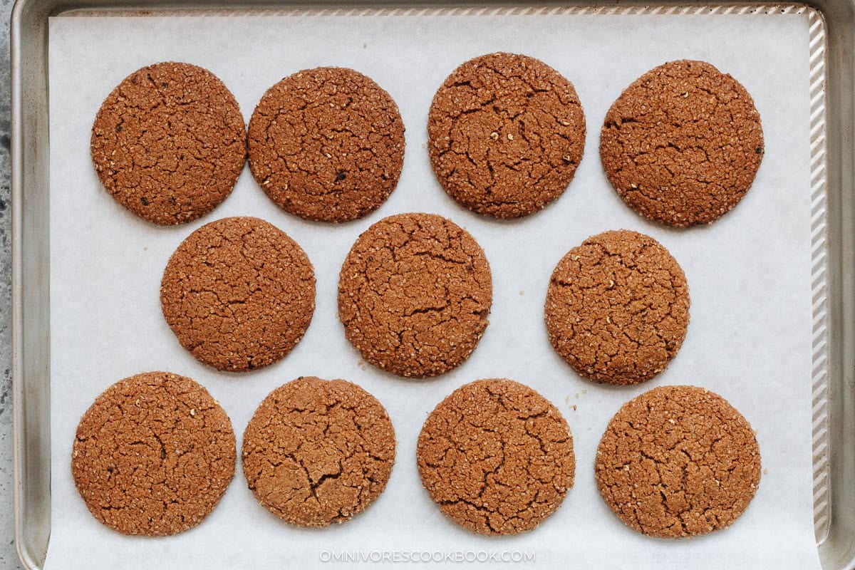Baked Sichuan peppercorn gingersnap cookies on a baking sheet