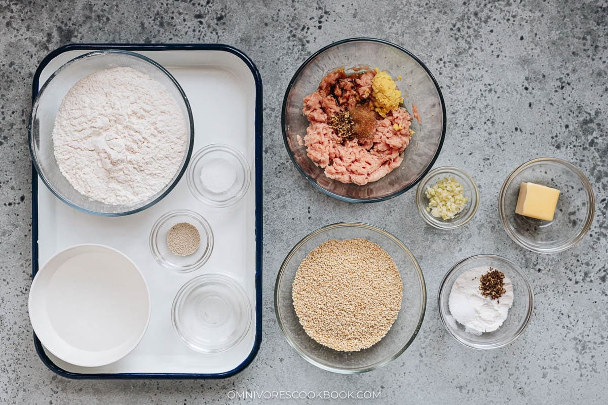 Ingredients for guo kui recipe, including flour, pork, sesame seeds, and butter