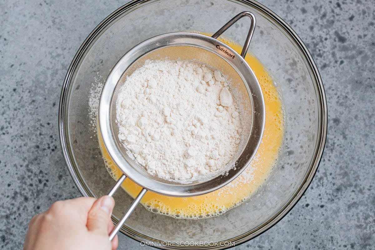flour into the egg and water mixture