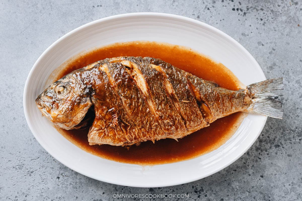 Chinese braised whole fish served in a plate