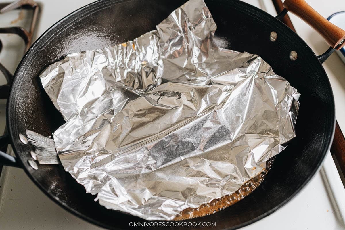 How to tent with foil while braising in wok
