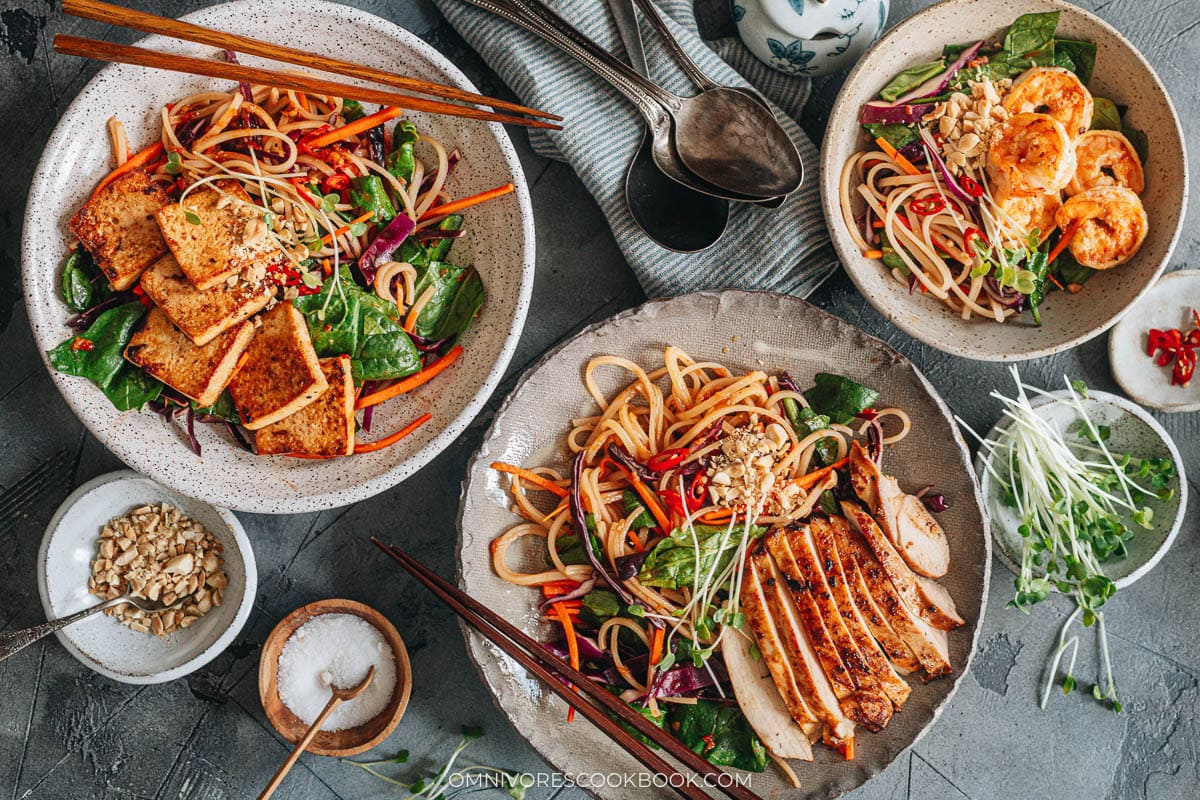 Spicy Rice Noodle Salad top with shrimp, tofu and chicken 

