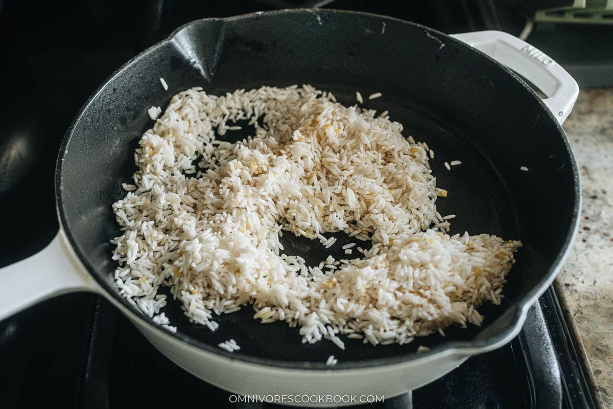  rice cooking in a skillet