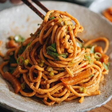 Hot dry noodles with chop sticks