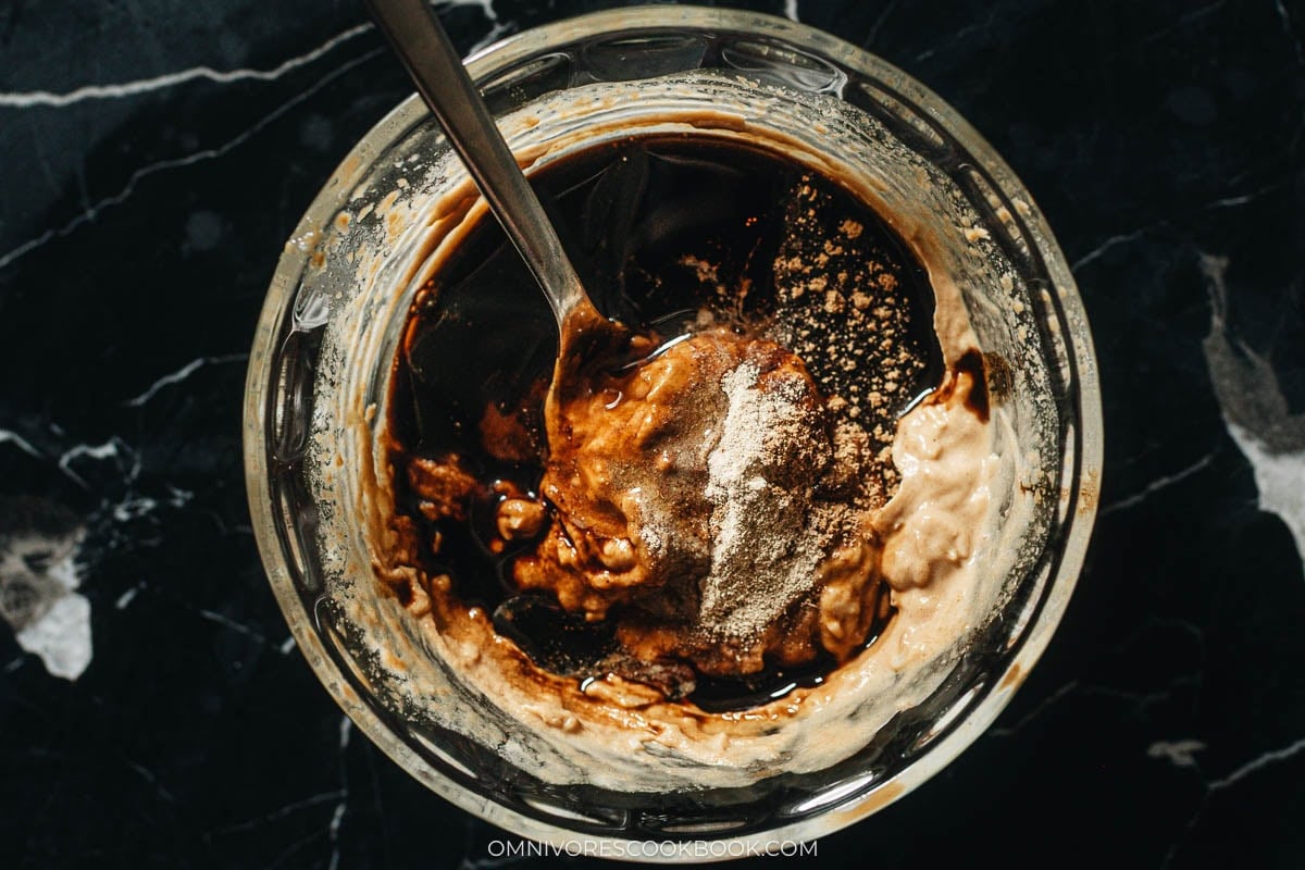 Mixing the sesame sauce in a bowl