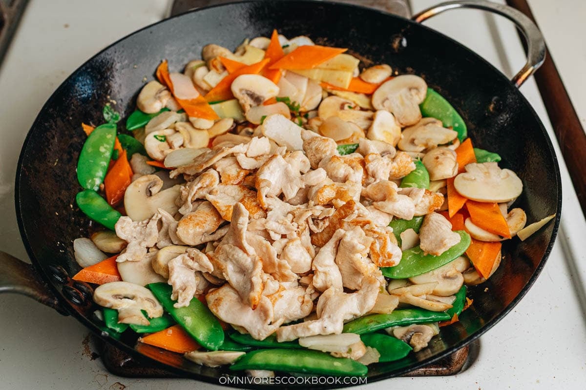 Add back the chicken and pour in the sauce