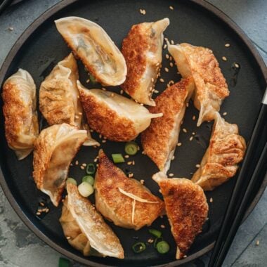 Raw and cooked homemade vegan dumplings