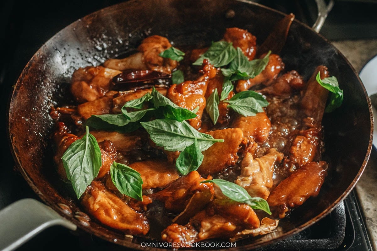 Toss in the basil in the pan with chicken