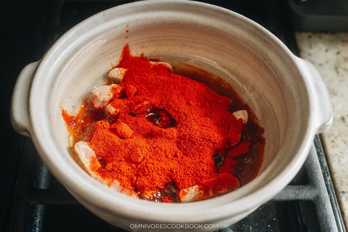 Add the gochugaru and cook