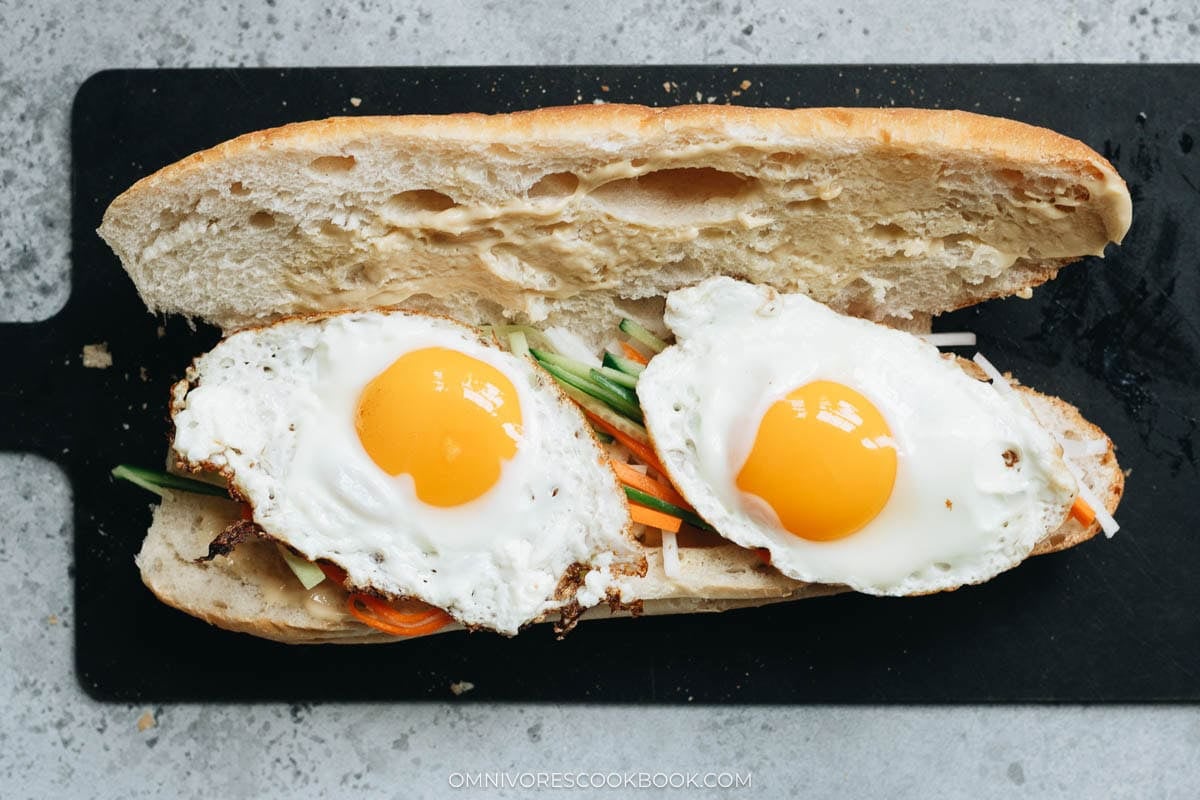 sandwich with vegetables and fried eggs