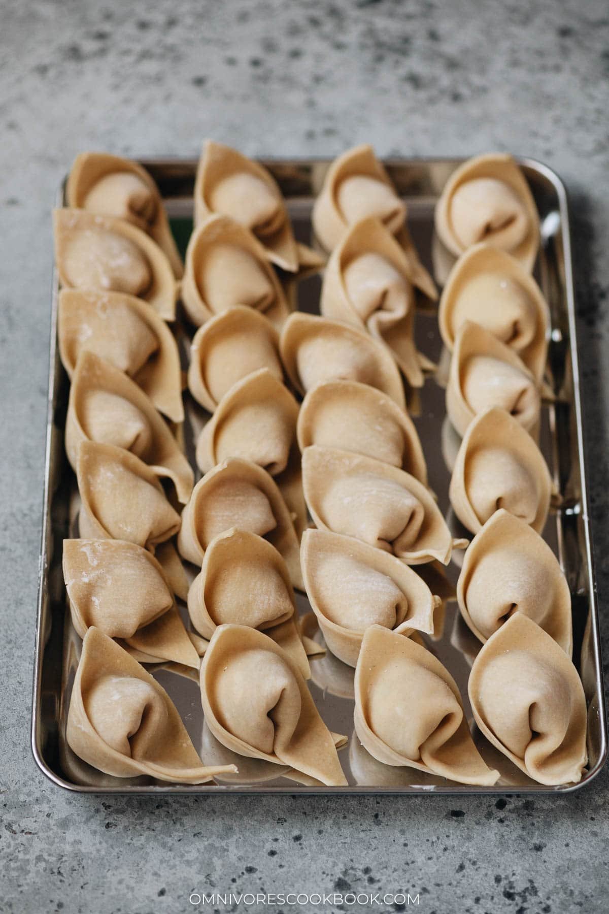 Tray of freshly wrapped wontons