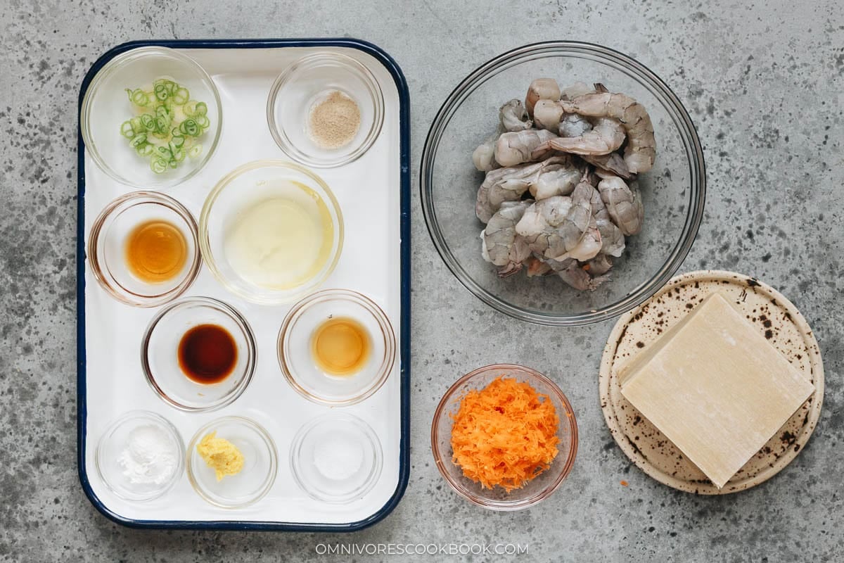 Ingredients for shrimp wonton filling including shrimp, carrot, scallions, and seasonings