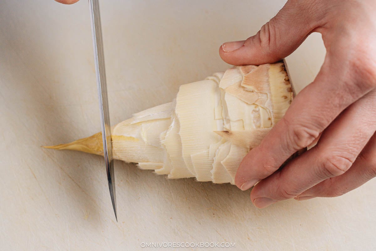 Slicing off the tip from bamboo shoot