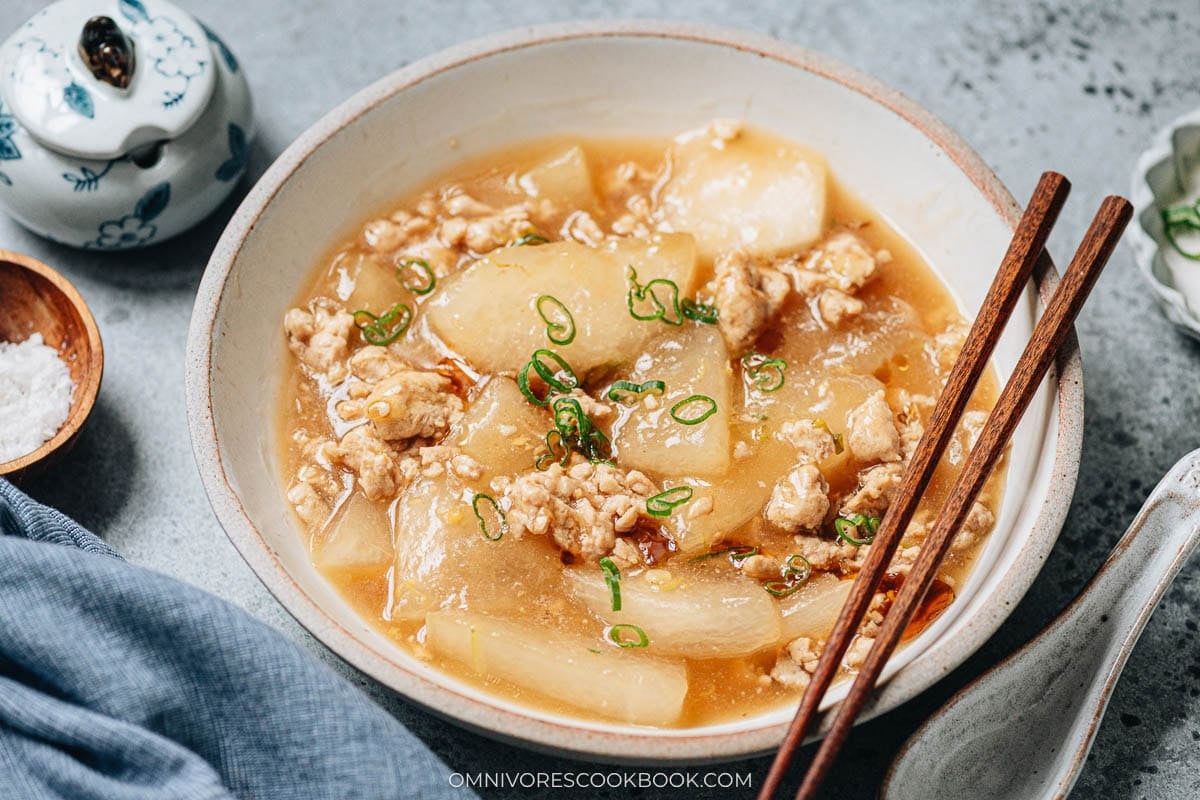 Tender winter melon slices with minced chicken in a glossy broth