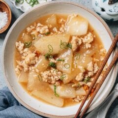 My braised winter melon uses ground chicken to lend a rich umami and texture to a chicken broth based sauce, with plenty of scallion and ginger to add fragrance to the silky winter melon. The chicken is briefly marinated to keep it tender and juicy.
