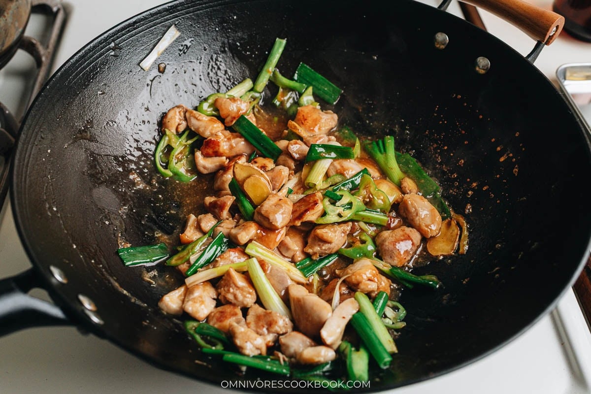 ginger chicken ingredients cooking in a pan