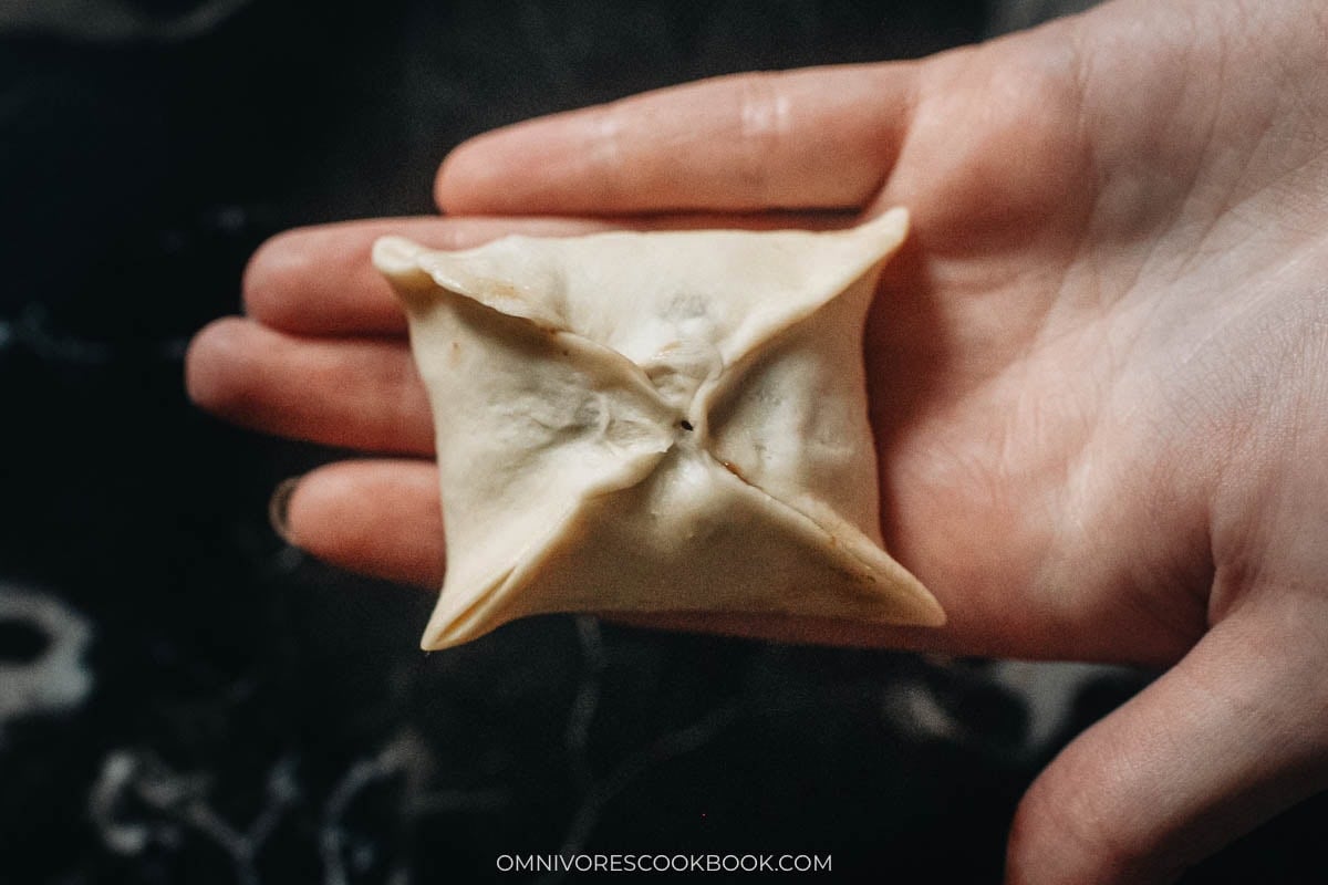 square bun with a cross on top
