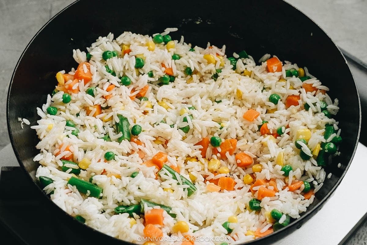 add the rice and cook with veggies