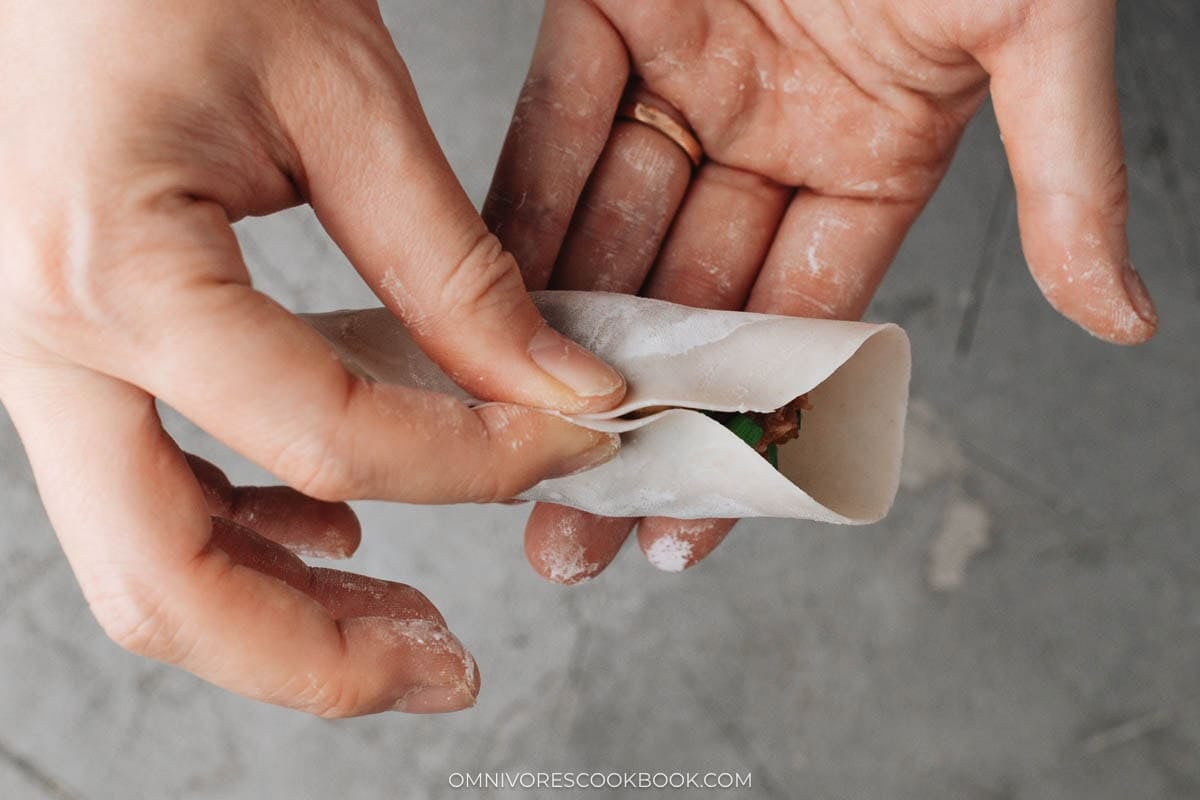 Fold the wrapper in half