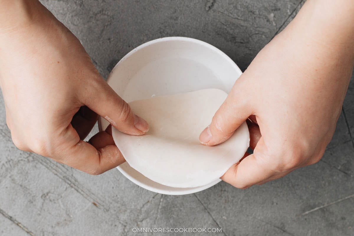 wrappers in bowl with water