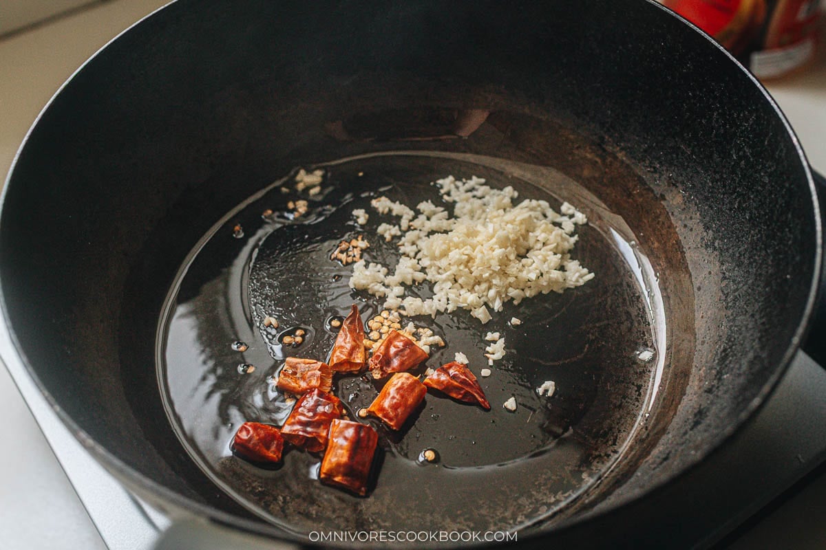 cooking the aromatics in a wok