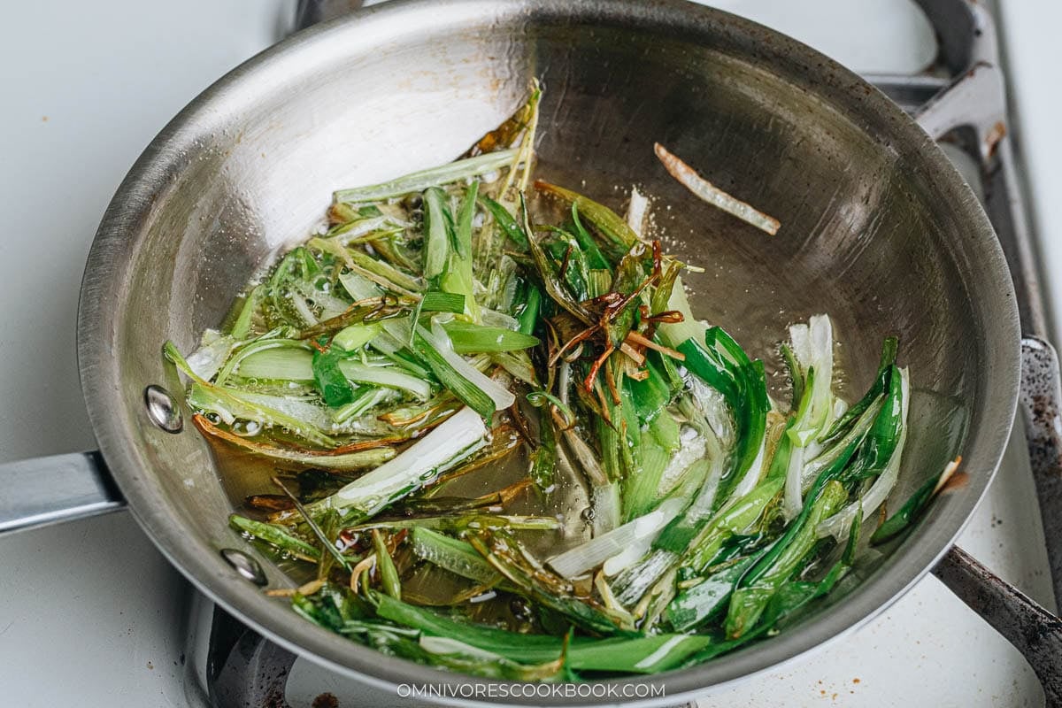 Cooking the scallions in the oil