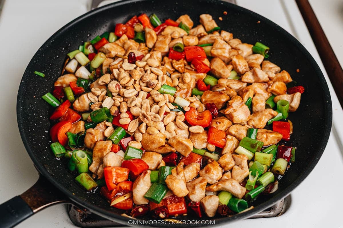 Kung Pao Chicken ingredients cooking in a pan