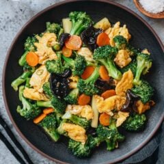 My broccoli and egg stir fry uses a fragrant brown sauce to create a rich taste. It has a fun texture with crisp veggies, chewy wood ear mushrooms and tender eggs. It uses everyday ingredients, comes together in under 30 minutes, and pairs perfectly with a bowl of steamed rice.