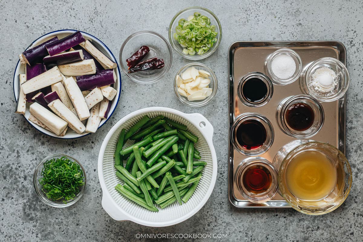 Ingredients for Chinese eggplant green bean stir fry on table