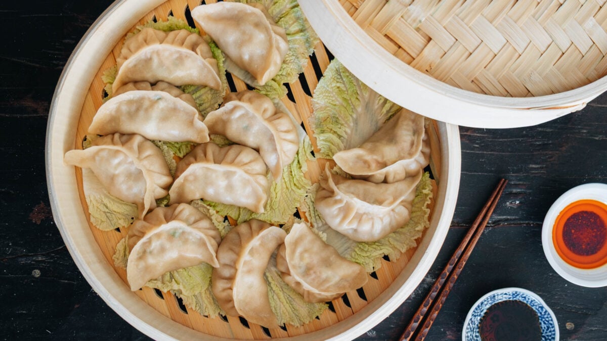pork dumplings on napa cabbage