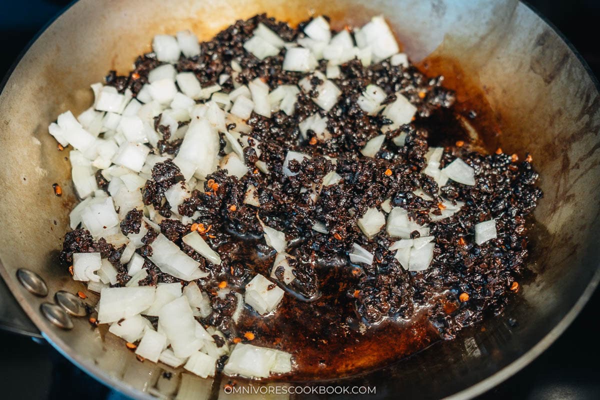 Roasting the beans and onion