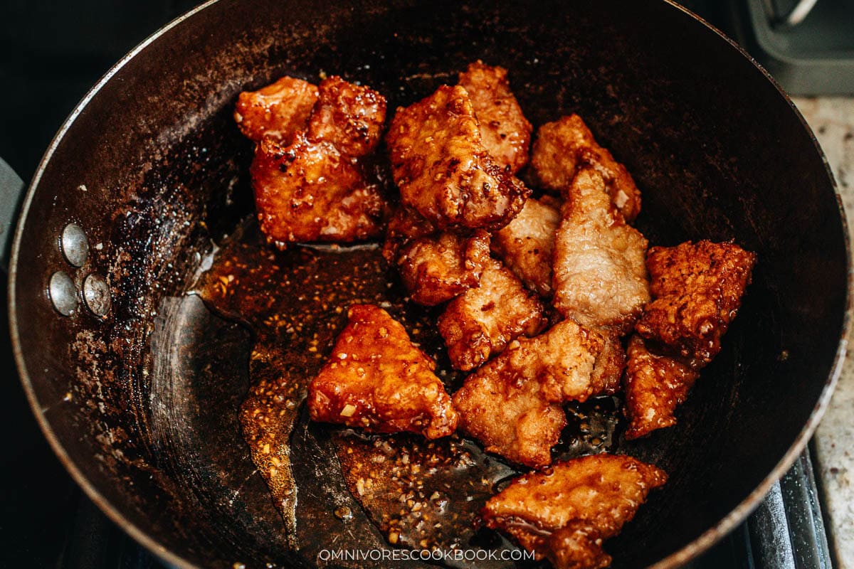 mixing pork with sauce