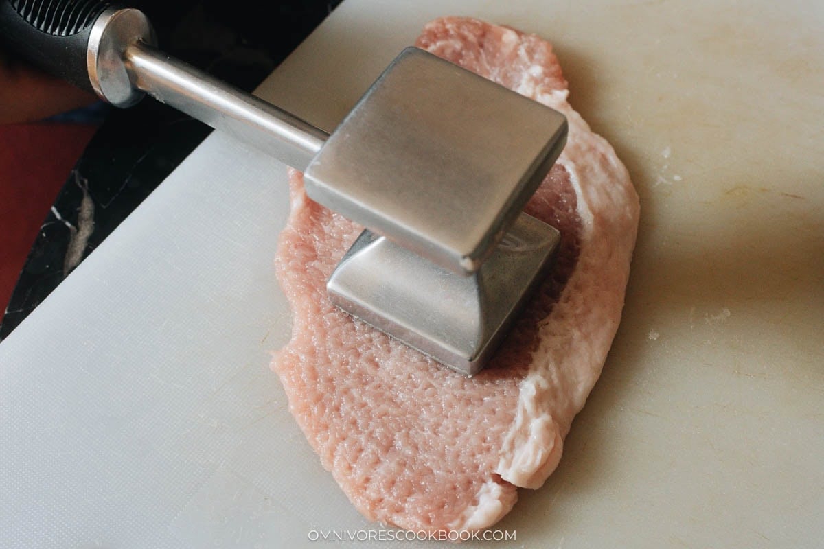 Pound the pork chop thin