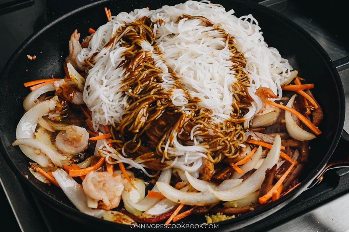 Adding the noodles and sauce