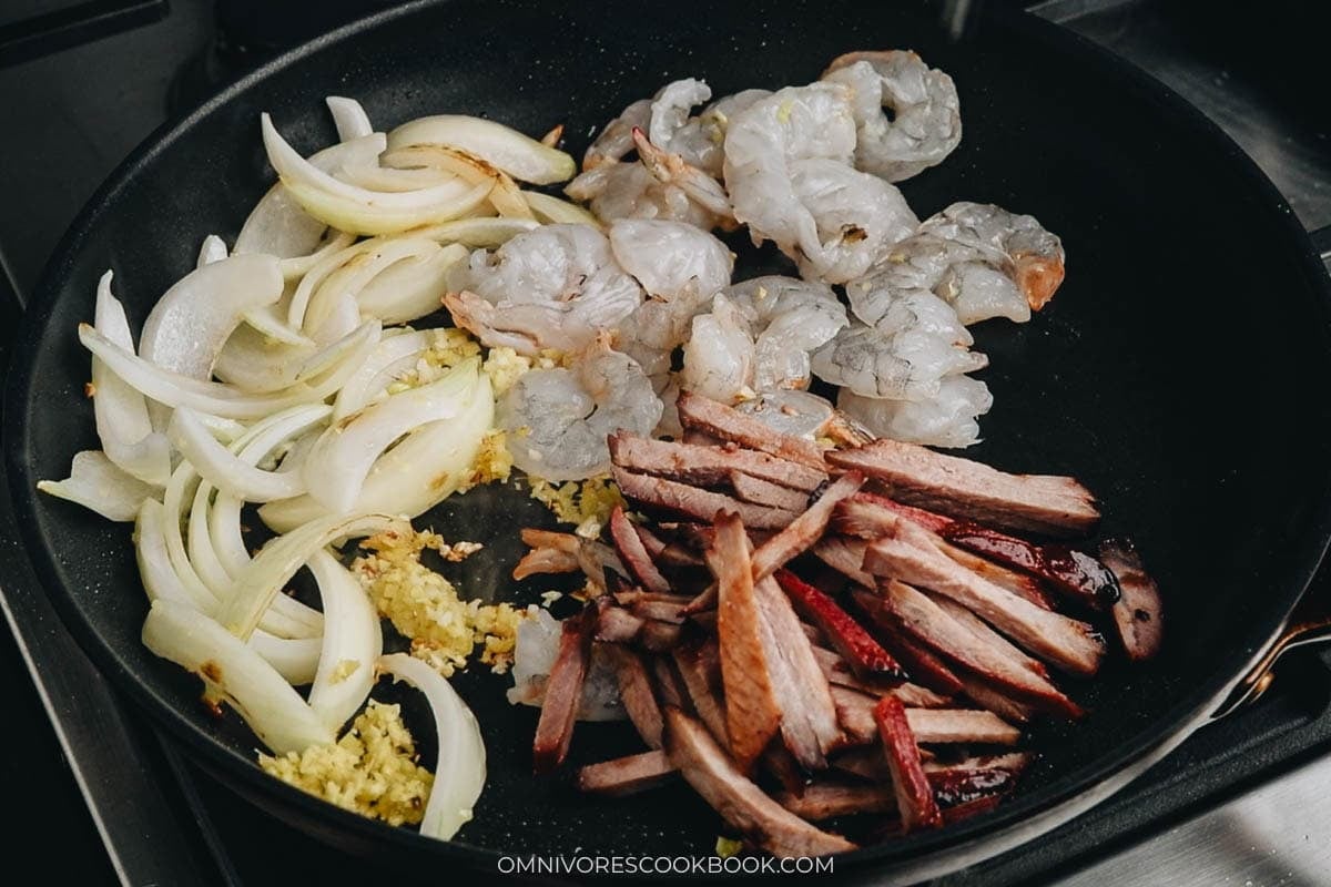 searing the protein in a pan 