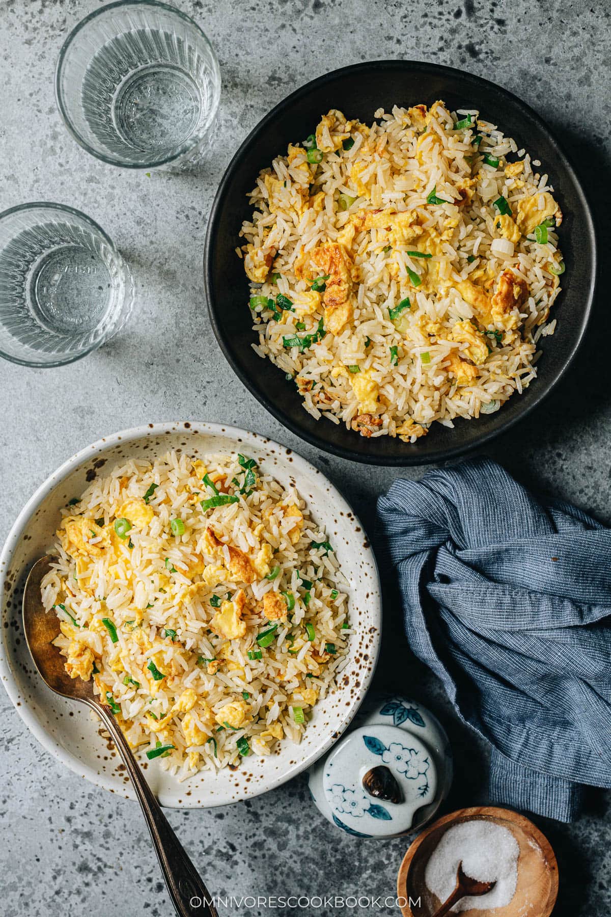 Homemade egg fried rice served in two bowls