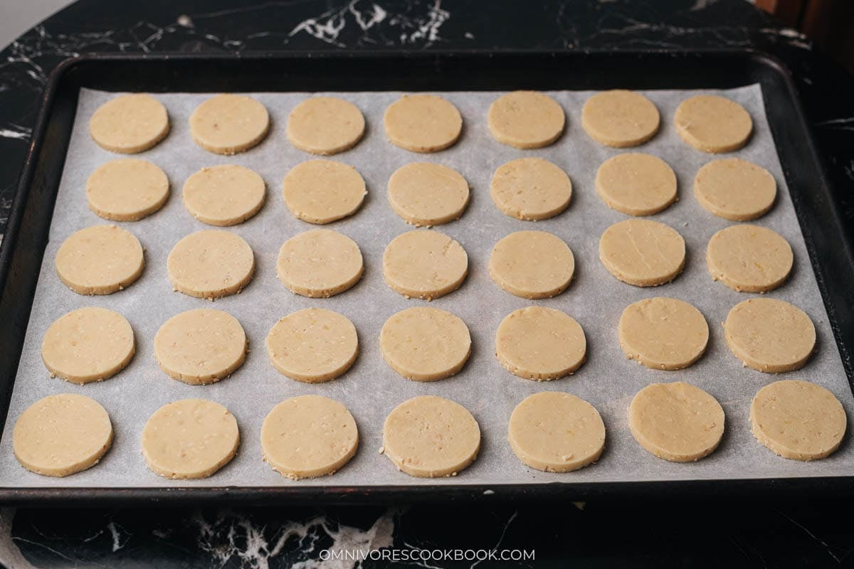 Unbaked sesame cookies on sheet pan