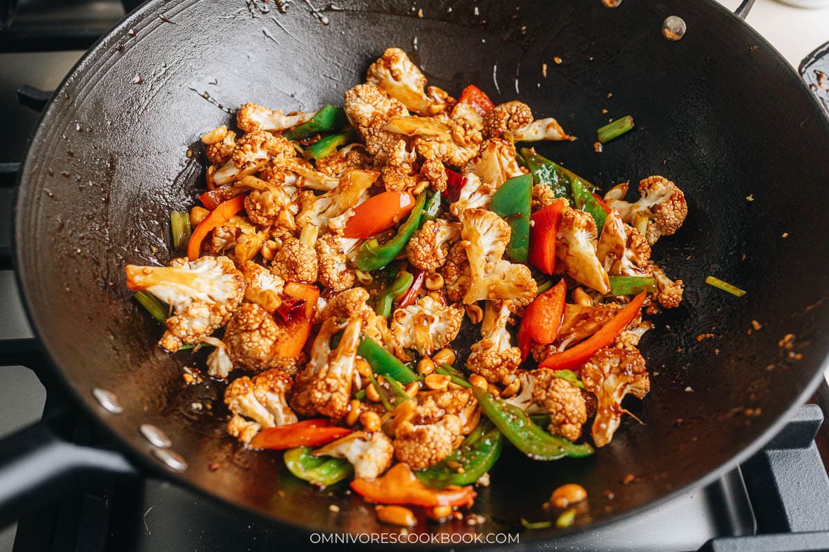 kung pao cauliflower finish cooking in a pan