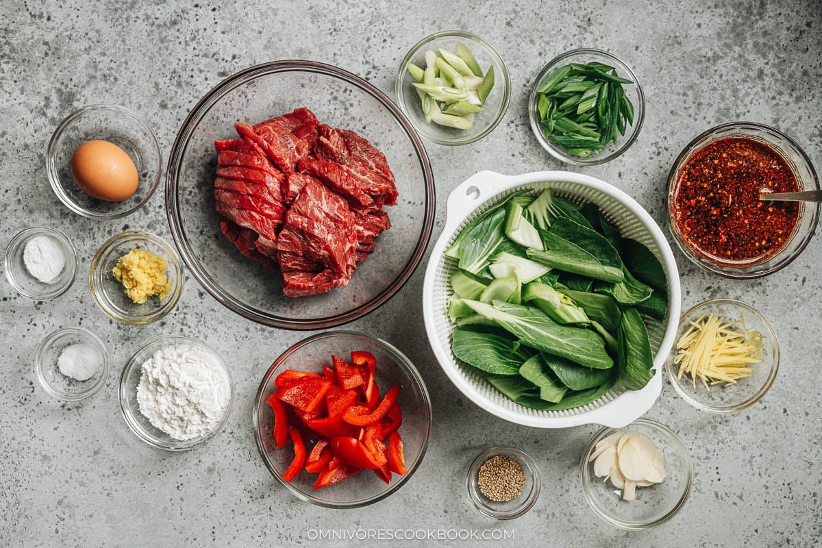Ginger Beef | Crispy juicy beef, crunchy bell peppers, and tender baby bok choy are tossed in a rich sauce that is sweet, spicy, sour, and peppery. Pair this ginger beef stir fry with a bowl of rice to soak up the deep, arresting flavors of the sauce, and you’ll have a princely takeout favorite with ten times the taste! {Gluten-free adaptable} Prep for ginger beef