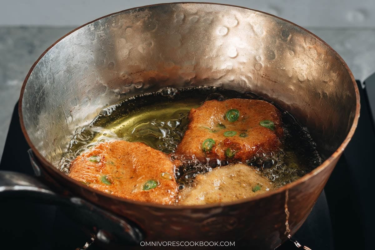 frying the fish cakes
