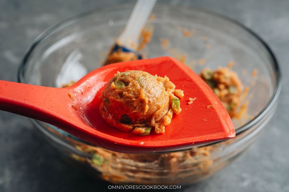 ball of fish mixture on a spatula