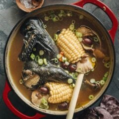 Chinese silkie chicken soup served in a dutch oven