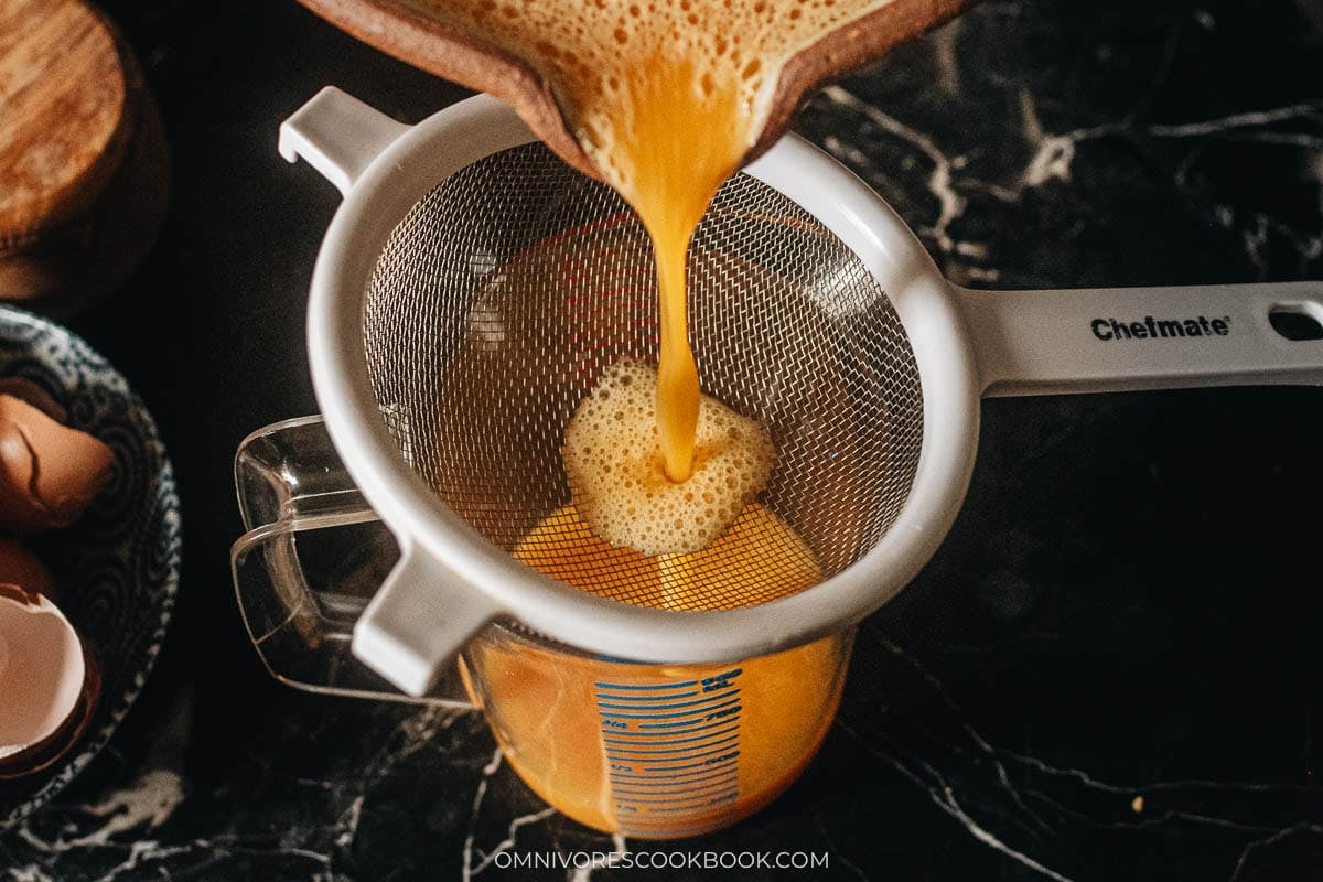 straining the eggs