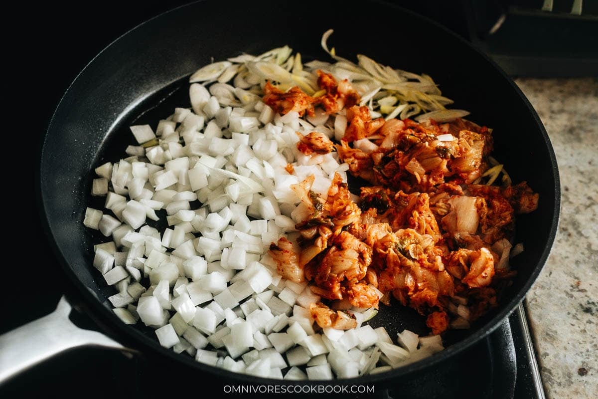 Cooking the kimchi and aromatics