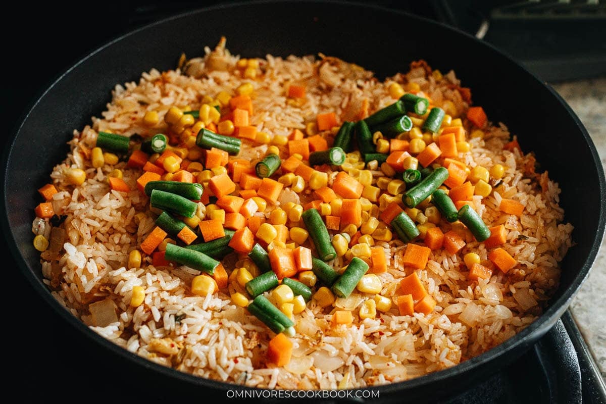 Adding the vegetables and sauce