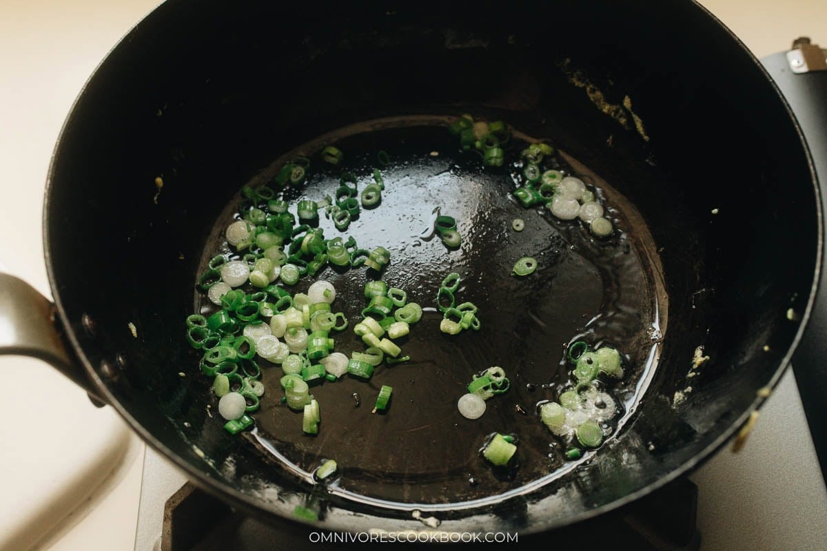 cooking the green onions in oil