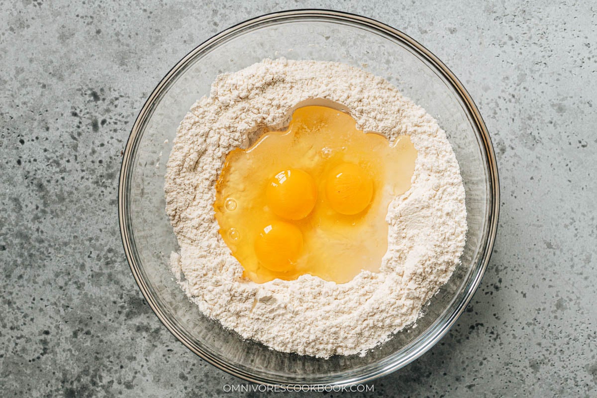 Mix the flour with salt, then add the eggs and water.